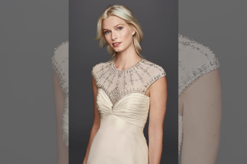 bridebook.co.uk jenny packham for david's bridal ivory dress with neckline details
