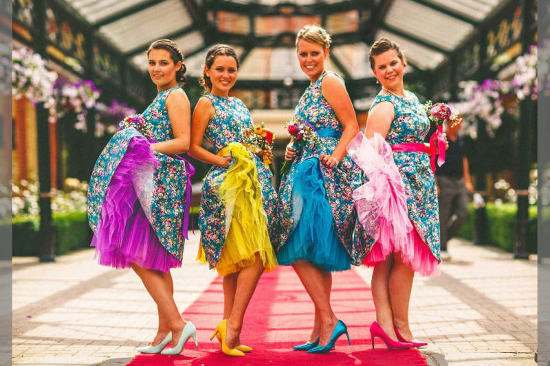 Bridebook.co.uk-bridemaids-in-colourful-dresses-by-miki-photography