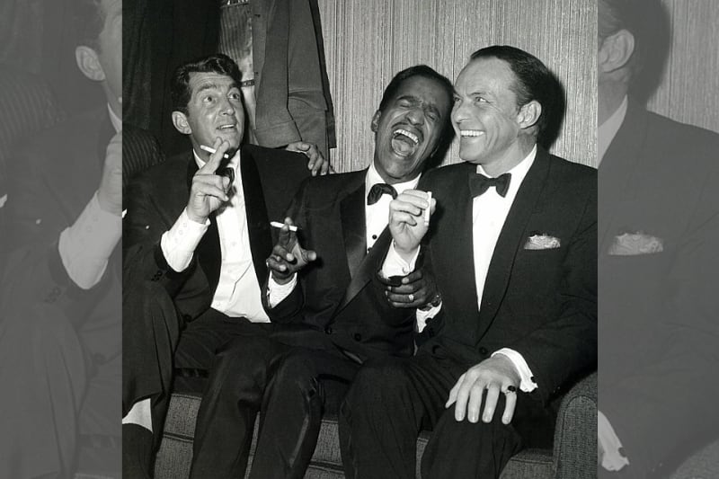Bridebook.co.uk- rat pack in tuxes laughing