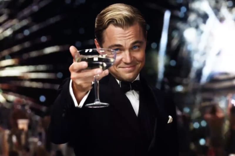 Bridebook.co.uk- leonardo di caprio toasting with champagne glass