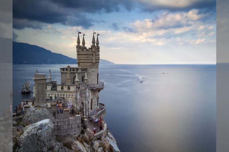 Bridebook.co.uk- castle standing on a cliff by the sea