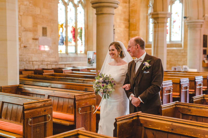 Faye's dad walking her down the aisle on her wedding day