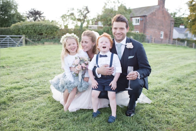 bridebook.co.uk wedding photograph of a couple with young kids