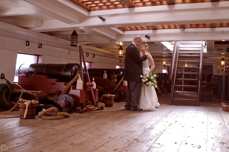 Newlyweds inside a ship at the National Museum of the Royal Navy.