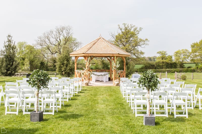 Outdoor ceremony set up at the manor hill house. 