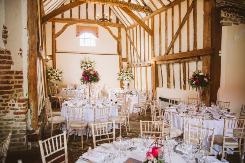 tables set for dinner inside the venue.