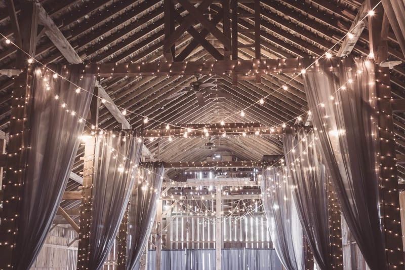 Wedding fairy lights decoration in beautiful barn wedding venue