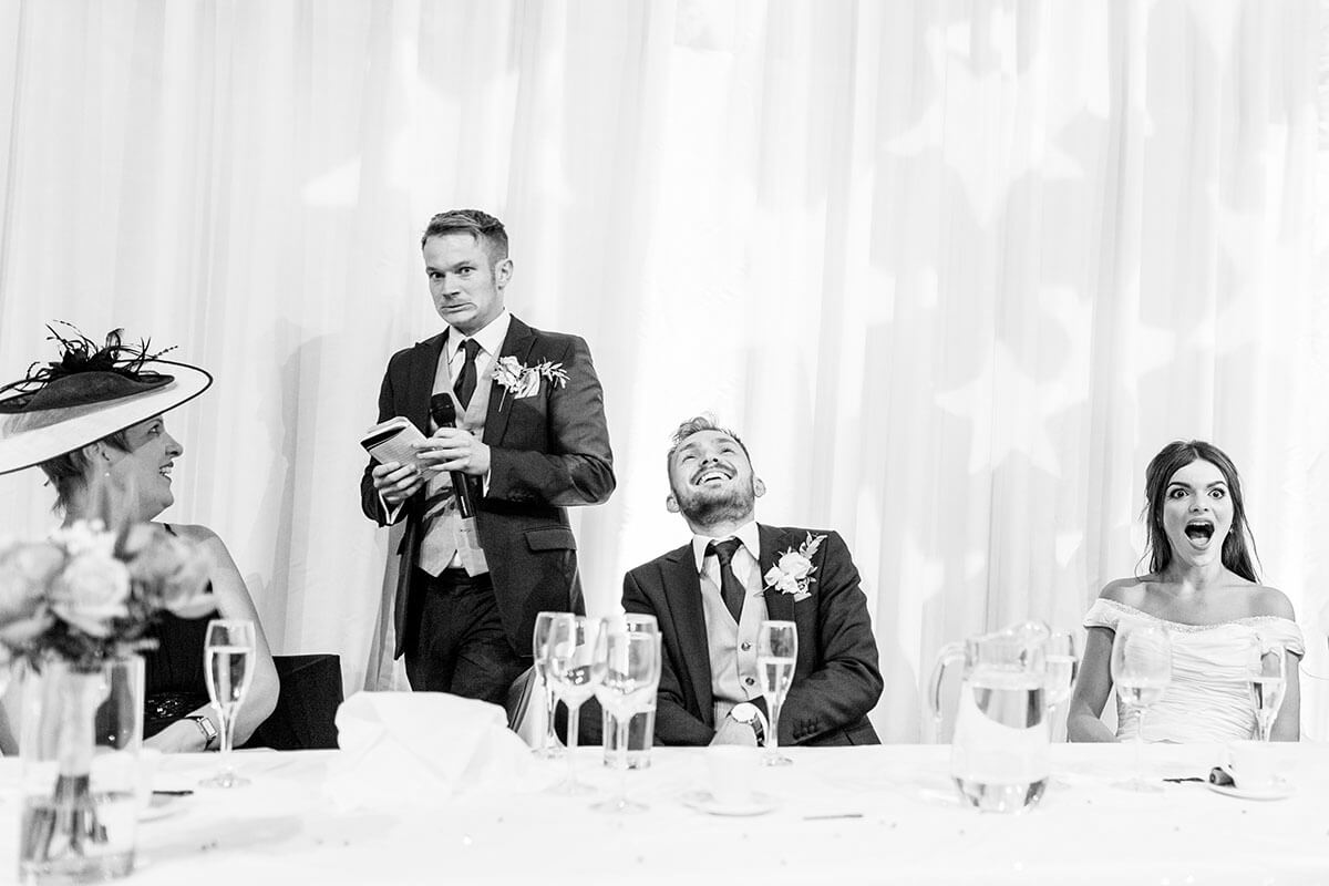 wedding guests laugh at wedding speech. best wedding photos of 2018