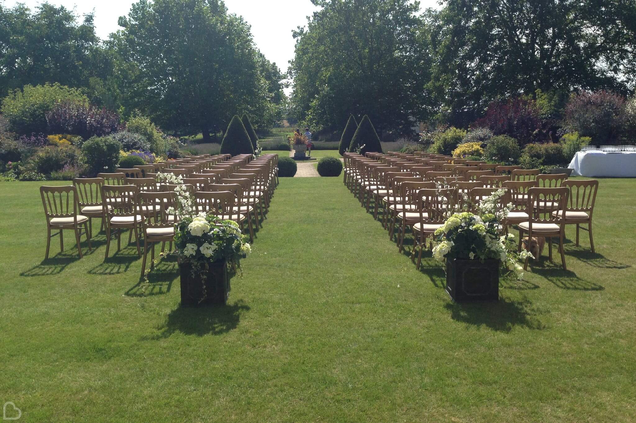 Outdoor wedding ceremony set up at hockering house in norfolk.