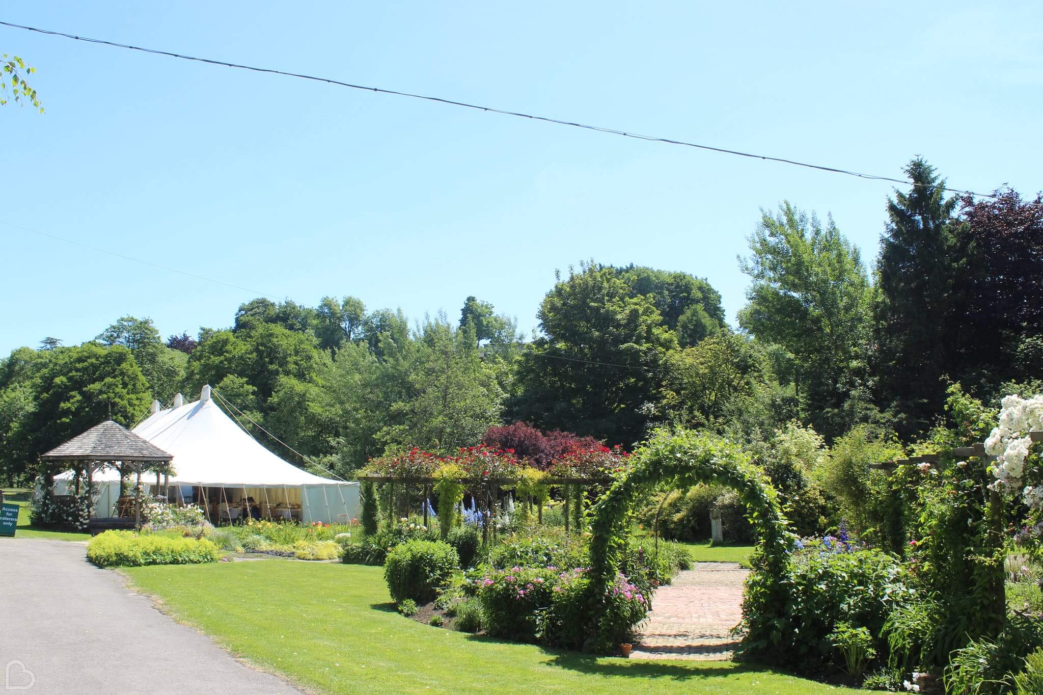 Beautiful wedding venue on a beautiful sunny day. Gants Mill & Garden is set up with marquees and a nicely kept garden.