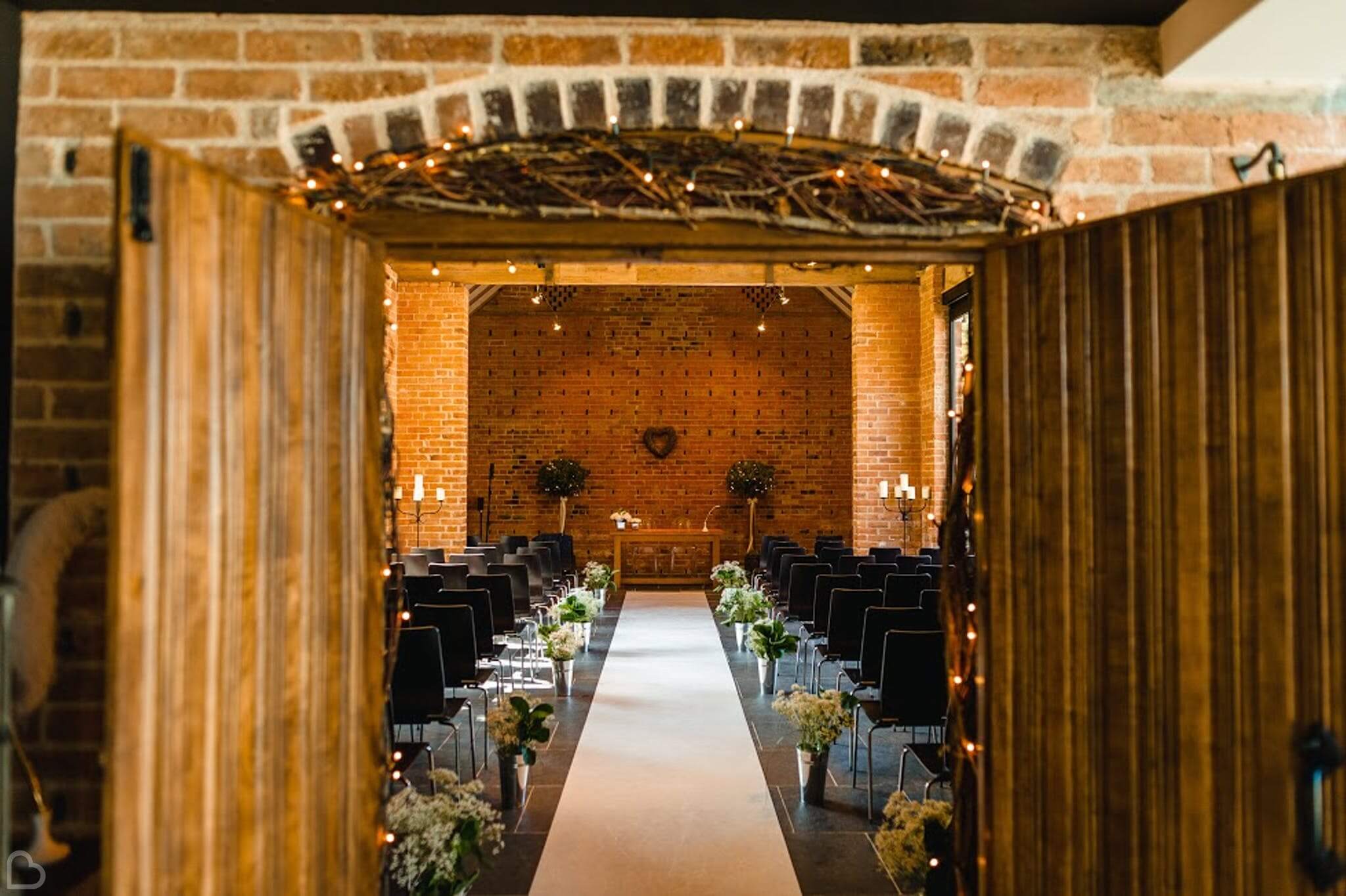 redhouse barn wedding venue set up for wedding ceremony