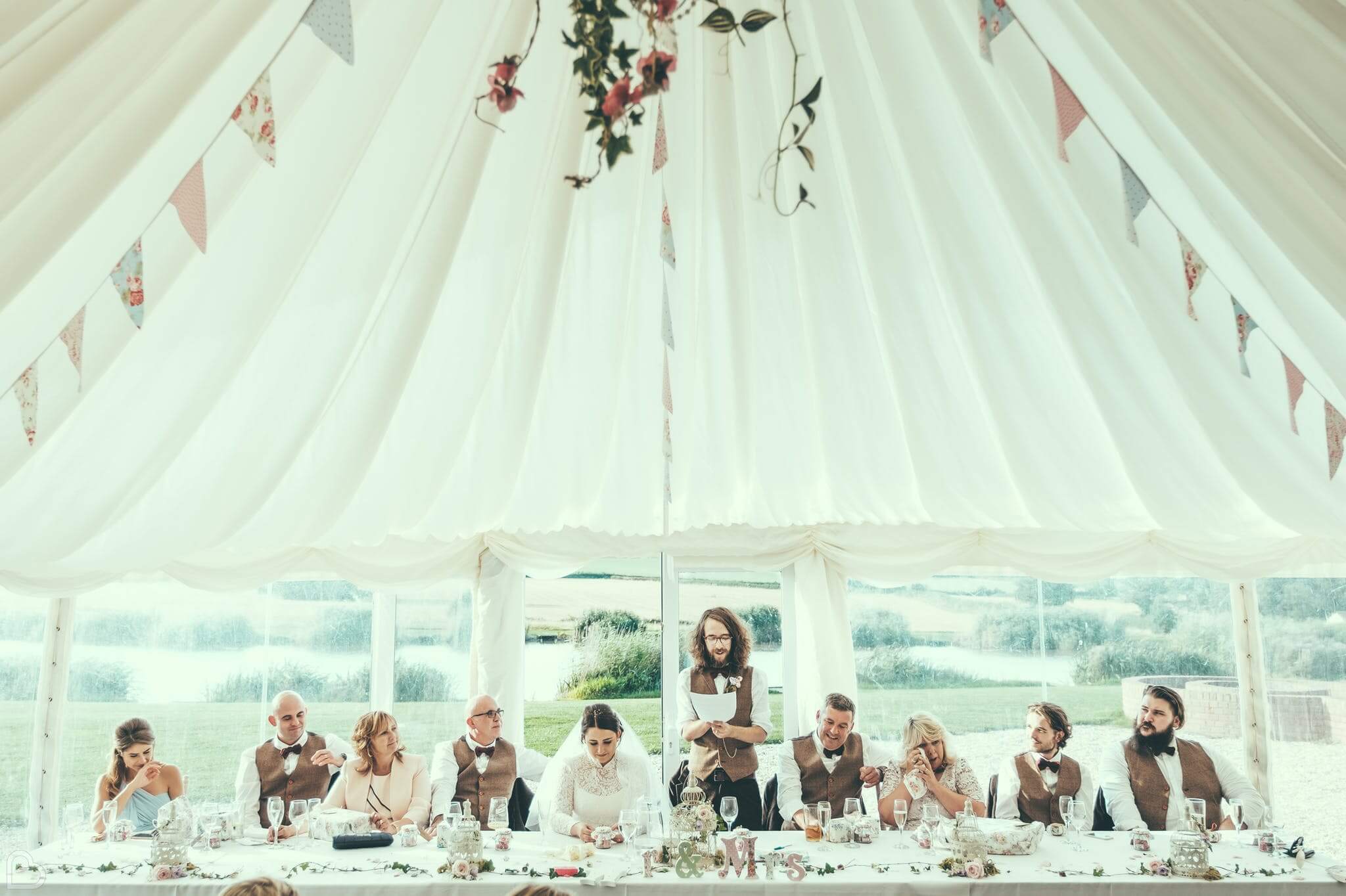 Wedding party taking place at the quantock lackes marquee, a marquee wedding venues in the uk