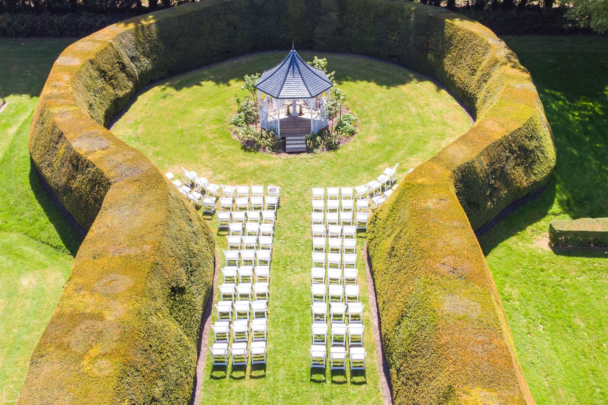 The garden at Hockwold Hall set up for a wedding ceremony.