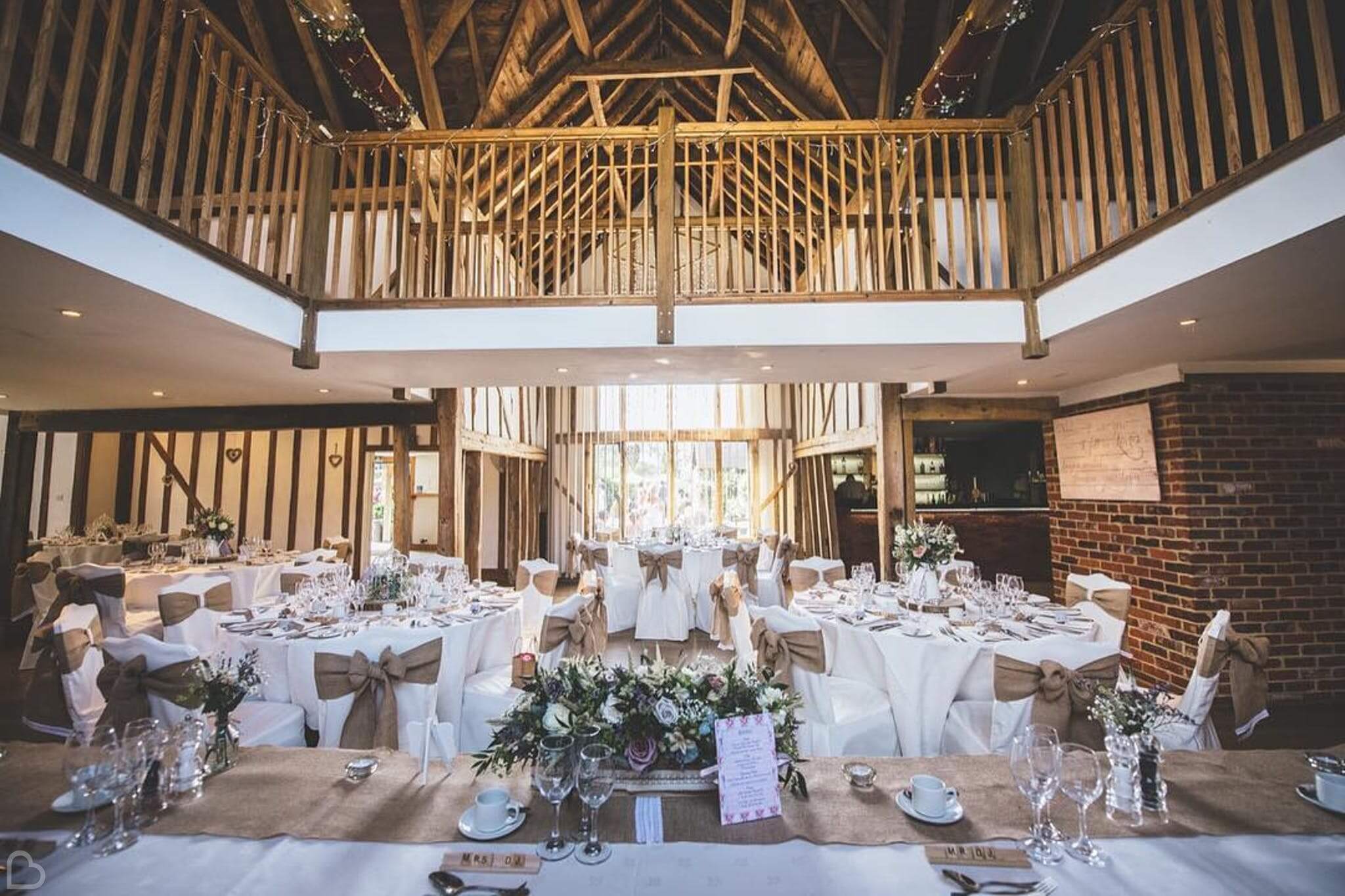 Maidens Barn set up for a wedding lunch.