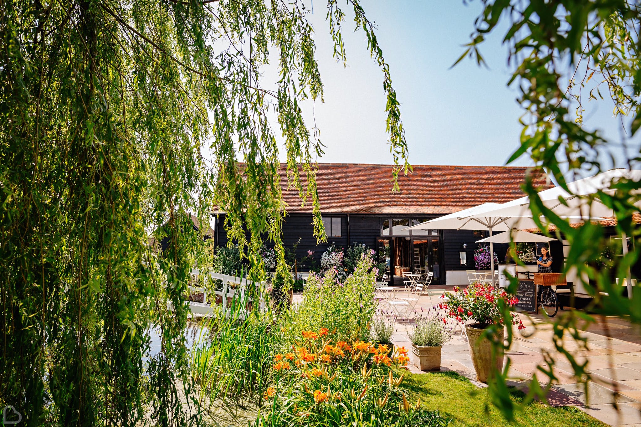 Beautiful and sunny essex wedding venue, covered in spring flowers. 