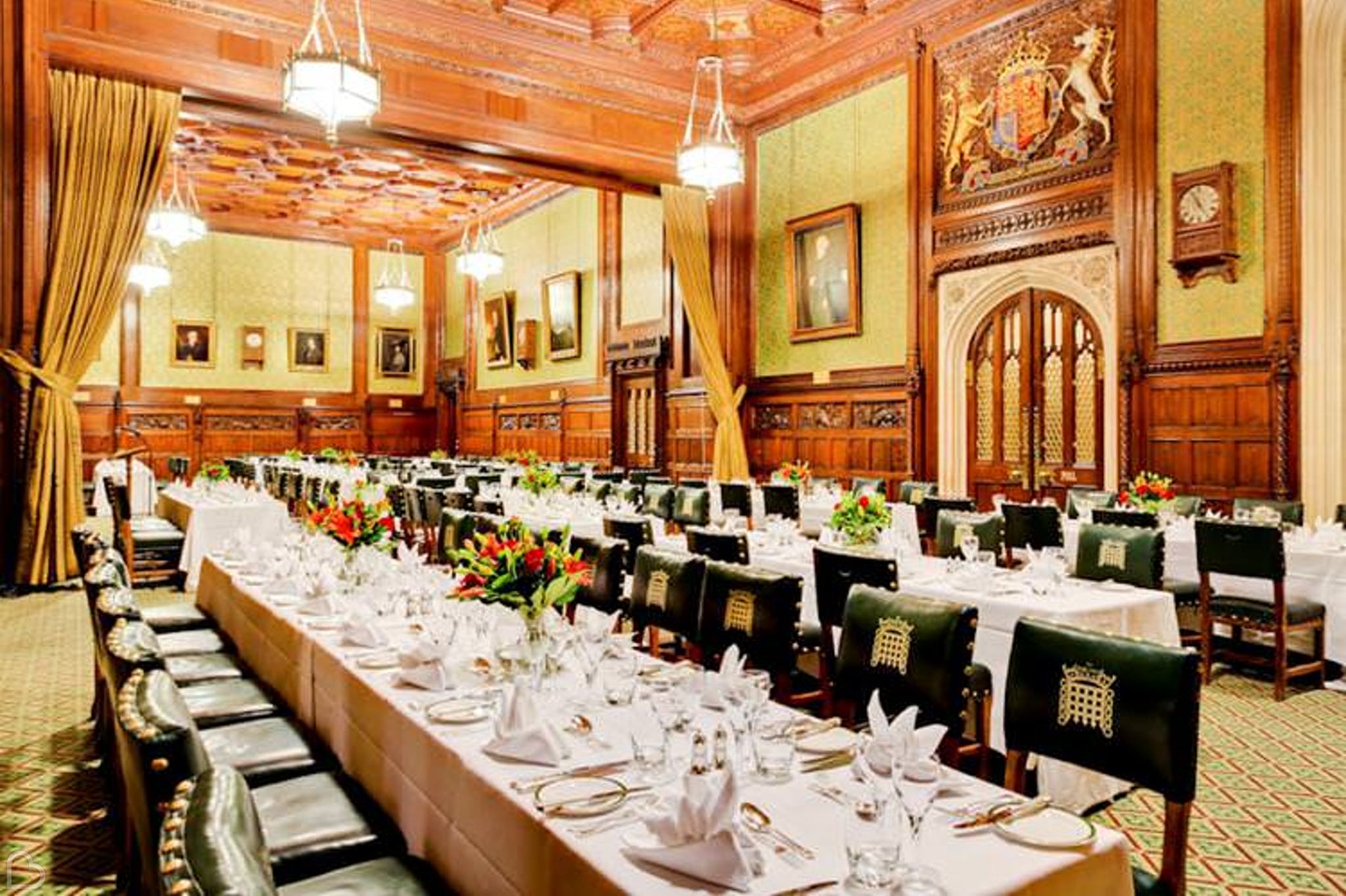 house of commons set up for wedding dinner.