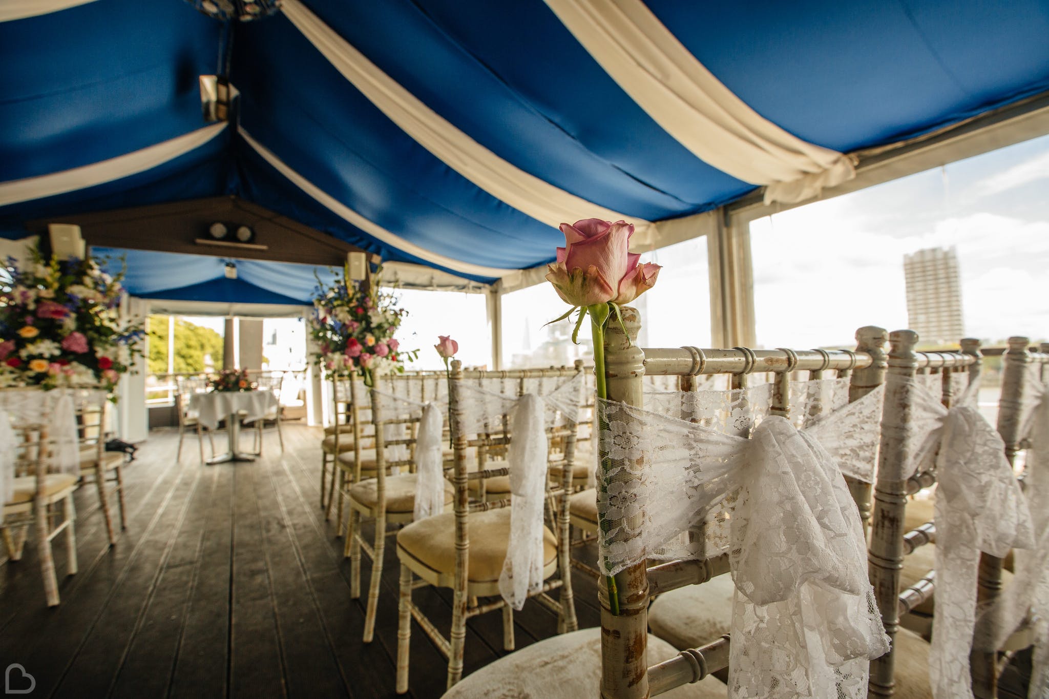 chairs set up for an outdoors ceremony at the yacht in london.