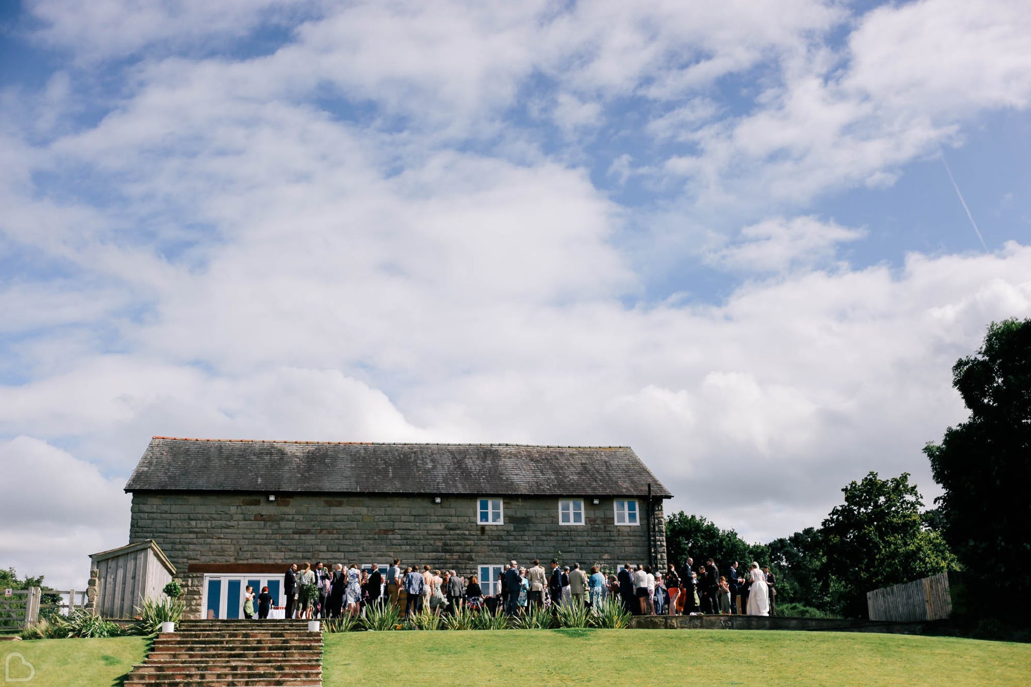 guests gather outside curdlands barn