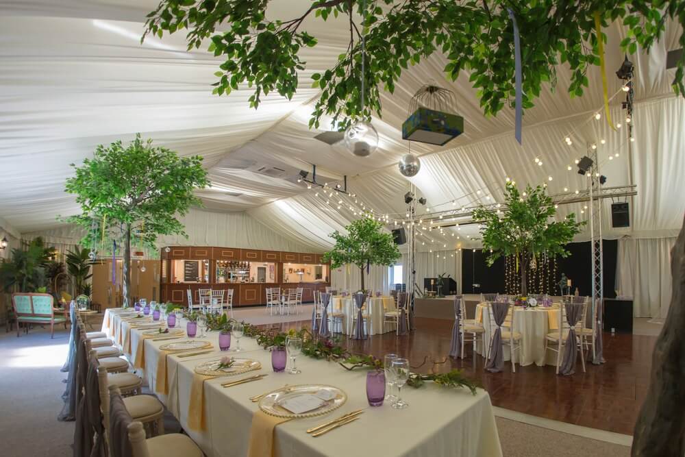 The interior of the venue decorated for a wedding.