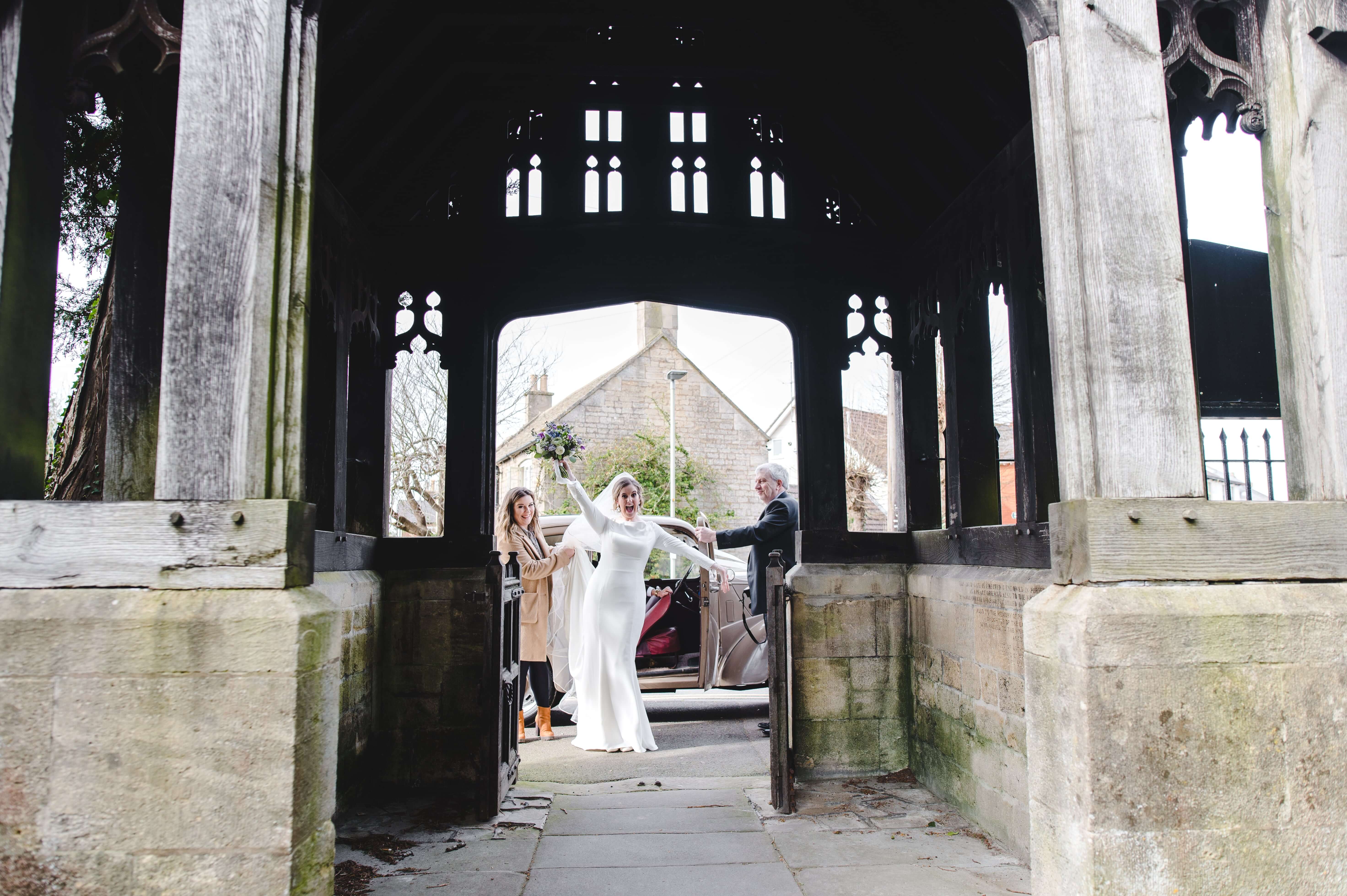 Faye Hughes stepping out of her wedding car ready to get married