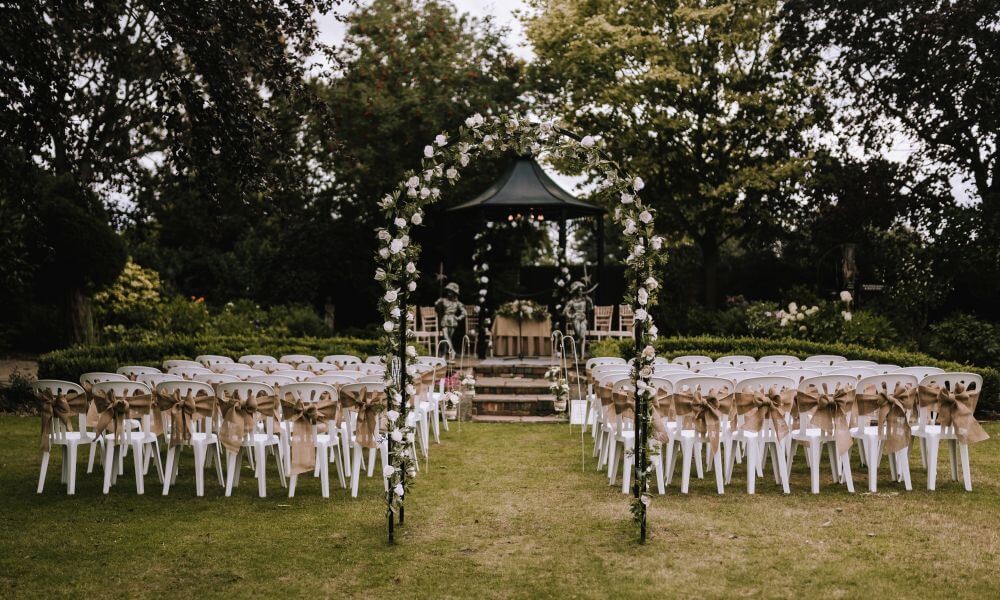 The garden gazebo is set for the civil ceremony outside. 