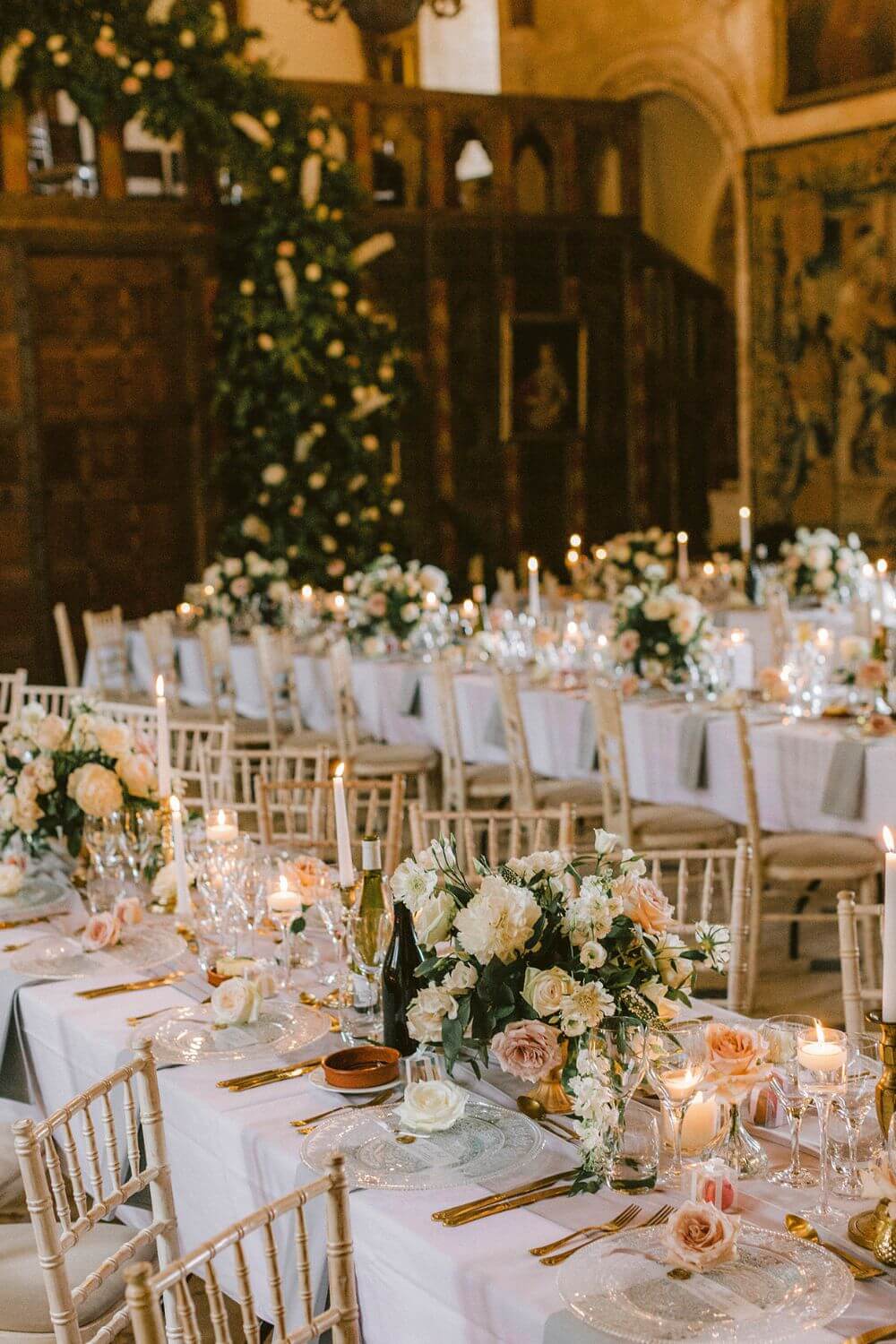 Tables set inside ready for for dinner.