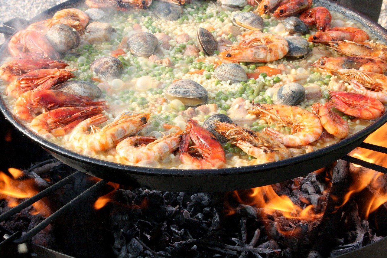 Delicious Spanish paella being cooked at wedding