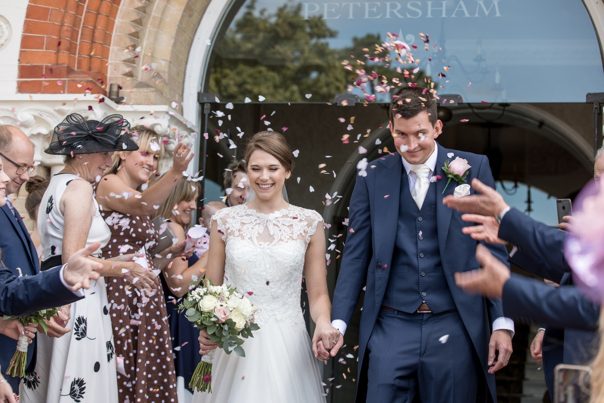 An archway that is part of the building serves as a place for the ceremony.