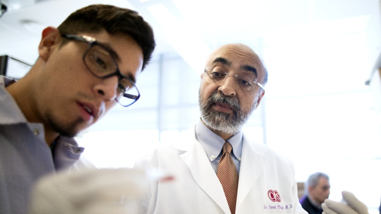 Sumeet Chugh, MD, right, has focused his career on developing ways to predict sudden cardiac arrest before it strikes. Photo by Cedars-Sinai.