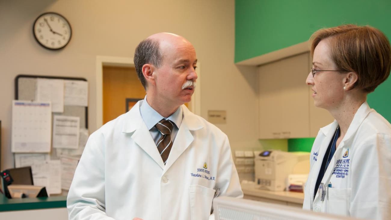 Theodore DeWeese, M.D., with nurse Nicole Mills.