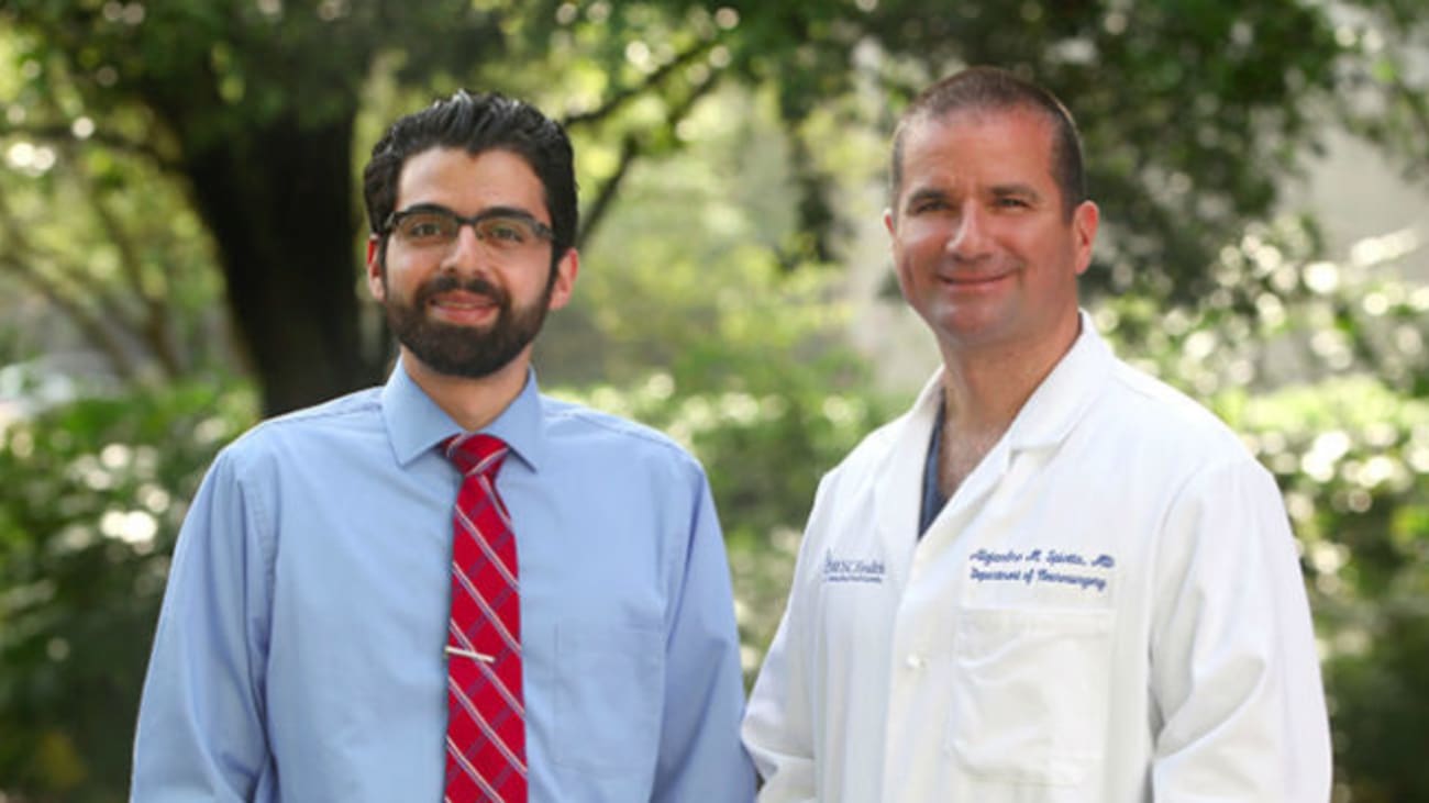 MUSC research team lead Dr. Spiotta (on right) worked with Dr. Alawieh to study endovascular thrombectomy procedure times both at MUSC and nationally.