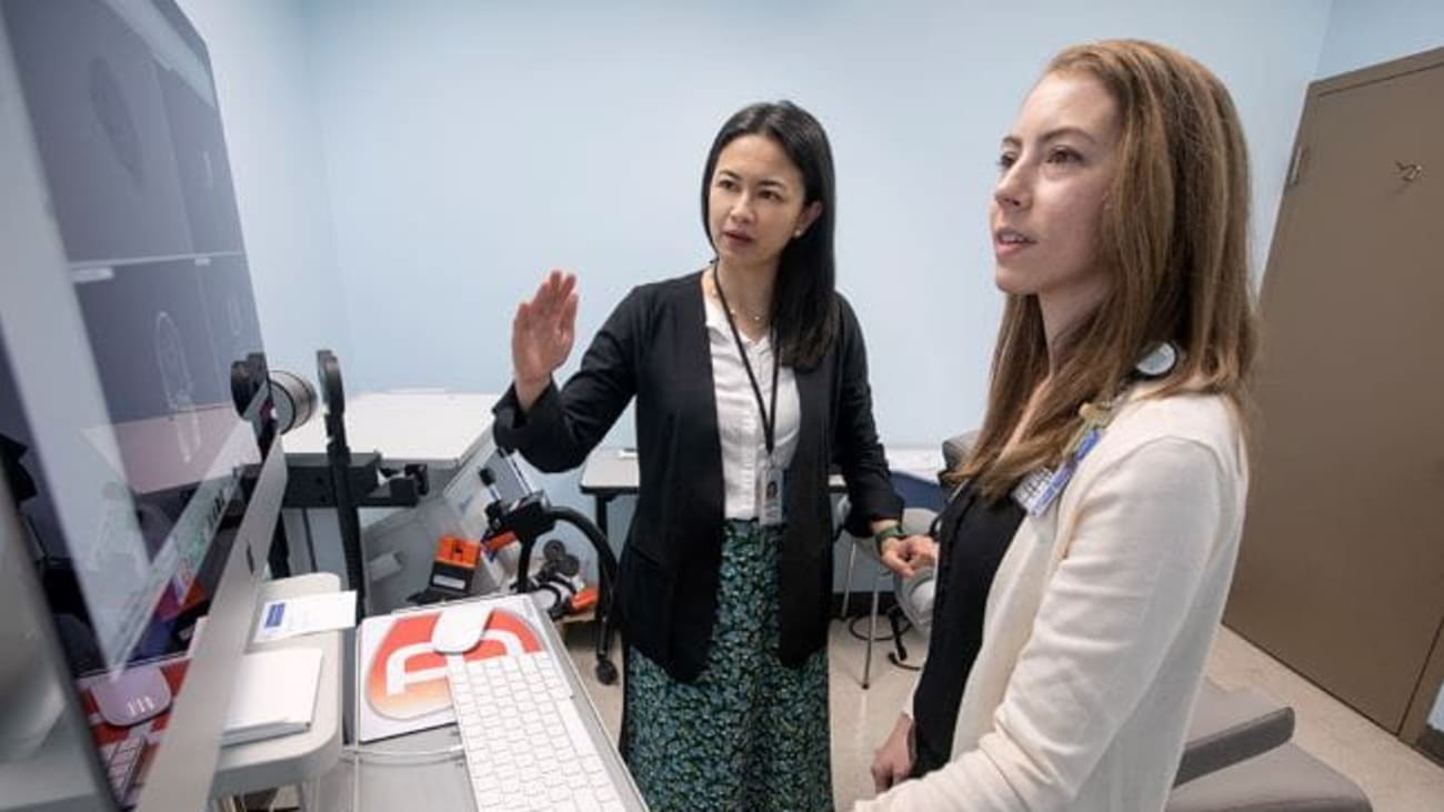 MUSC neuroscientists Andreana Benitez, Ph.D. (left), and Stephanie Fountain-Zaragoza, Ph.D. (right), discuss a neuroimaging result.