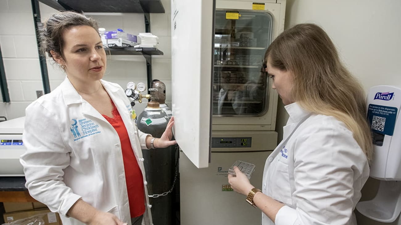 Dr. Katherine Chetta, left, and Dr. Mindy Engevik work in the lab to help find a cure for necrotizing enterocolitis in babies, particularly preterm babies. Photos by Sarah Pack