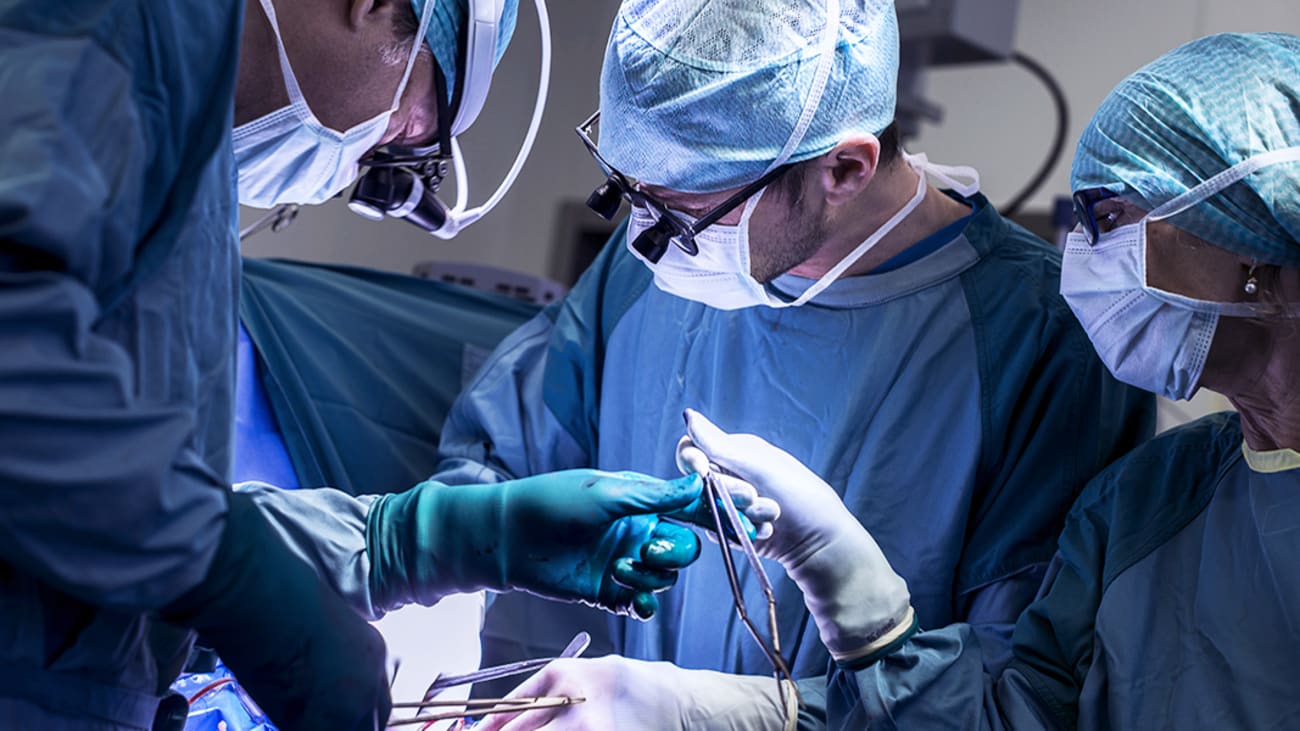 image of surgeons in OR performing procedure