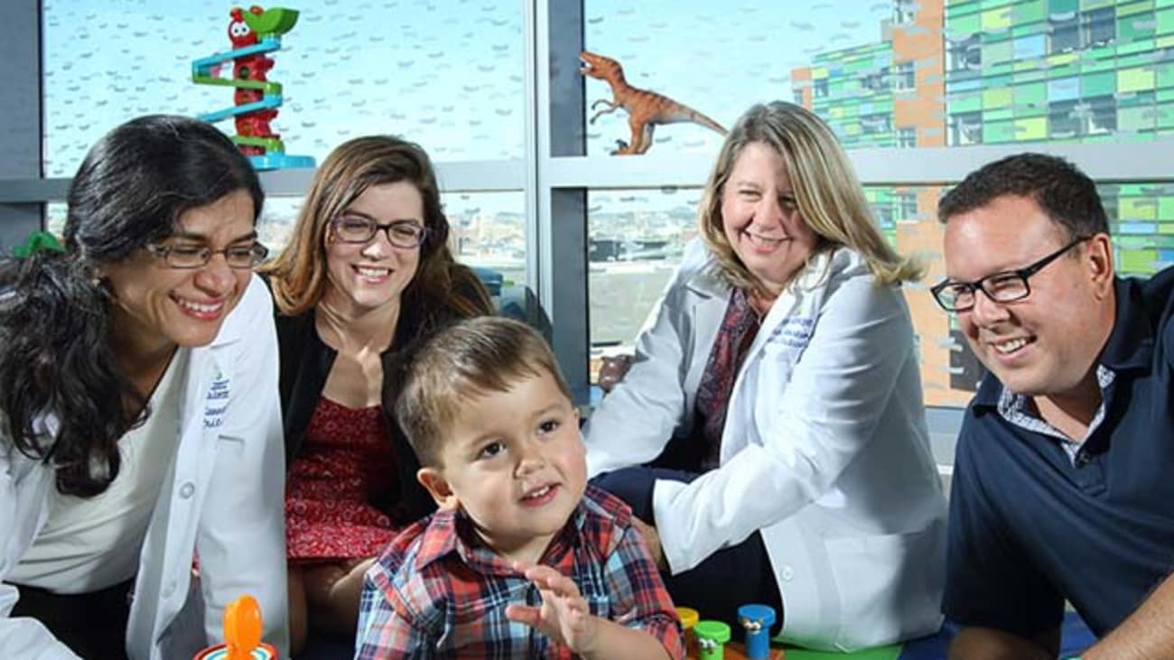 Elliot Correa, at the center of attention with, from left, pediatric intensivist Sujatha Kannan, his mother Jennifer Correa, pediatric intensivist Courtney Robertson, and father Michael Correa.