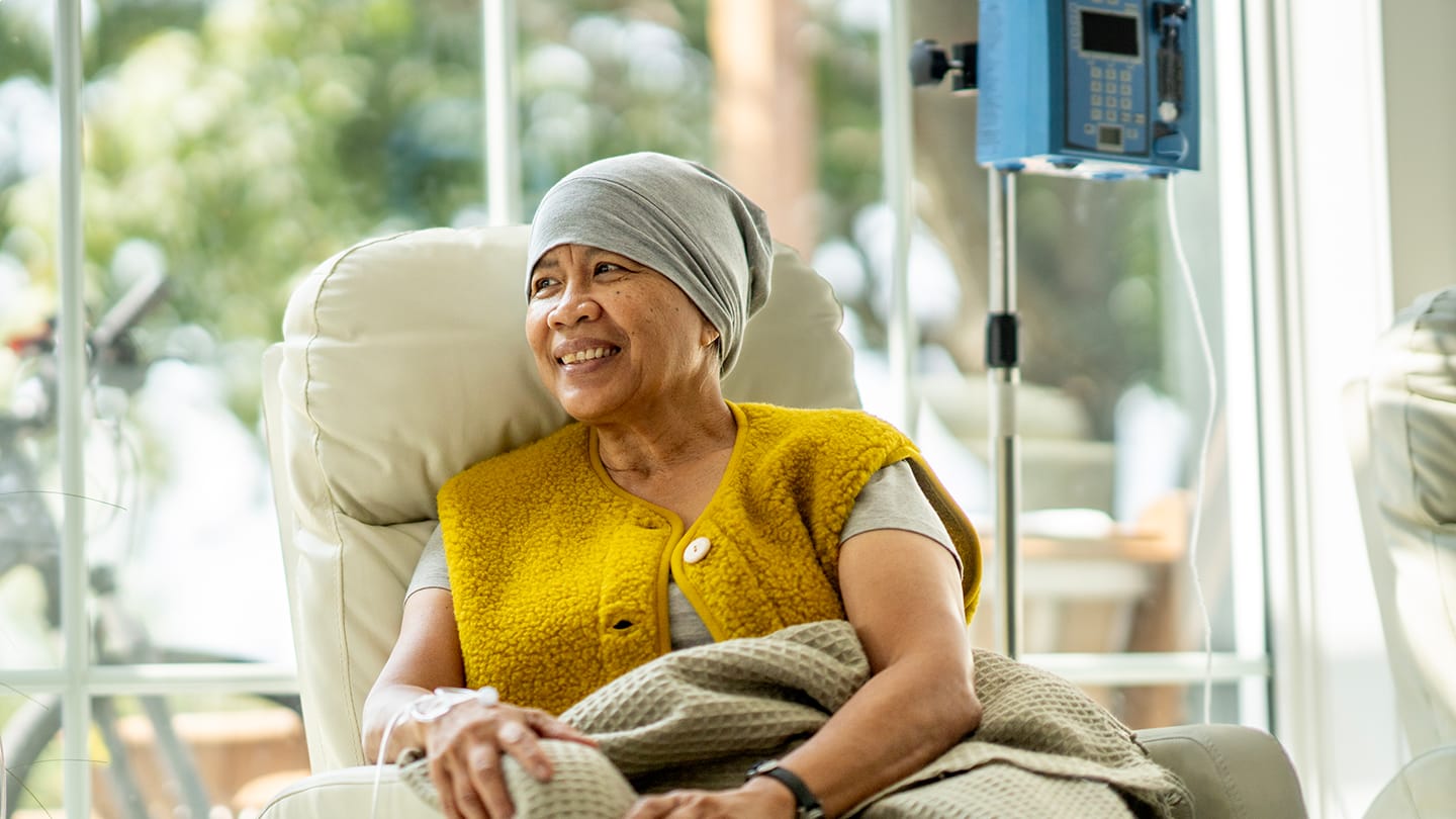 Patient speaking with another person during a clinical visit.