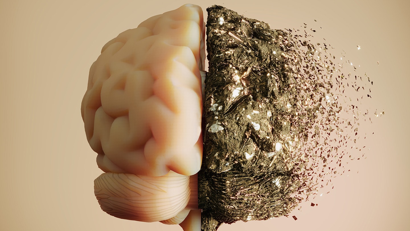 Conceptual illustration of a brain dissolving into particles.