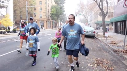 A pediatric heart patient runs a mini-marathon