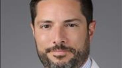 Michael Enrique Gomez, M.D.