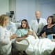 Behavioral Intervention Team nurse practitioner Maureen Lewis, left, demonstrates how to approach patients about potential mental health concerns. The program is directed by psychiatrist Pat Triplett and aided by psychiatric social worker, Deborah “Sunny” Mendelson, far right.