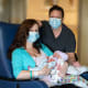 Amanda and Angela with their triplets in the UC Davis NICU.