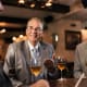 UT Southwestern researchers found that income levels partially influenced the relationship between IQ and drinking habits. They said higher IQ may lead to stressful jobs or more opportunities for social drinking among high earners. (Photo credit: Getty Images)