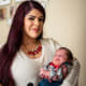 Diana Estrada-Arauza and her baby Sergio, now safe at home