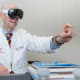 David G. Armstrong, DPM, a podiatric surgeon at Keck Medicine of USC, tests the Apple Vision Pro headset.