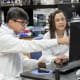 Dr. Anand Mehta (left) and Dr. Shaaron Ochoa-Rios (right) in the laboratory. Photograph by Sarah Pack.