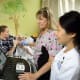 Pediatric radiologist Misun Hwang, at right, evaluates the contrast ultrasound scan of a young patient by sonographer Donna Seyfert.