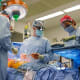 Dr. Michael Mulligan, center, leads a lung-transplant procedure in 2009.