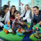 Elliot Correa, at the center of attention with, from left, pediatric intensivist Sujatha Kannan, his mother Jennifer Correa, pediatric intensivist Courtney Robertson, and father Michael Correa.