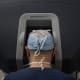 Seated at a monitor displaying endoscopic images of the surgical field, Dr. Lucian Lozonschi performs robotic CABG.