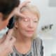 A patient receives an eye examination. UT Southwestern researchers discovered that a gene involved in lipid metabolism might be associated with macular degeneration, diabetic retinopathy, and other disorders affecting the eyes. (Photo credit: Getty Images)